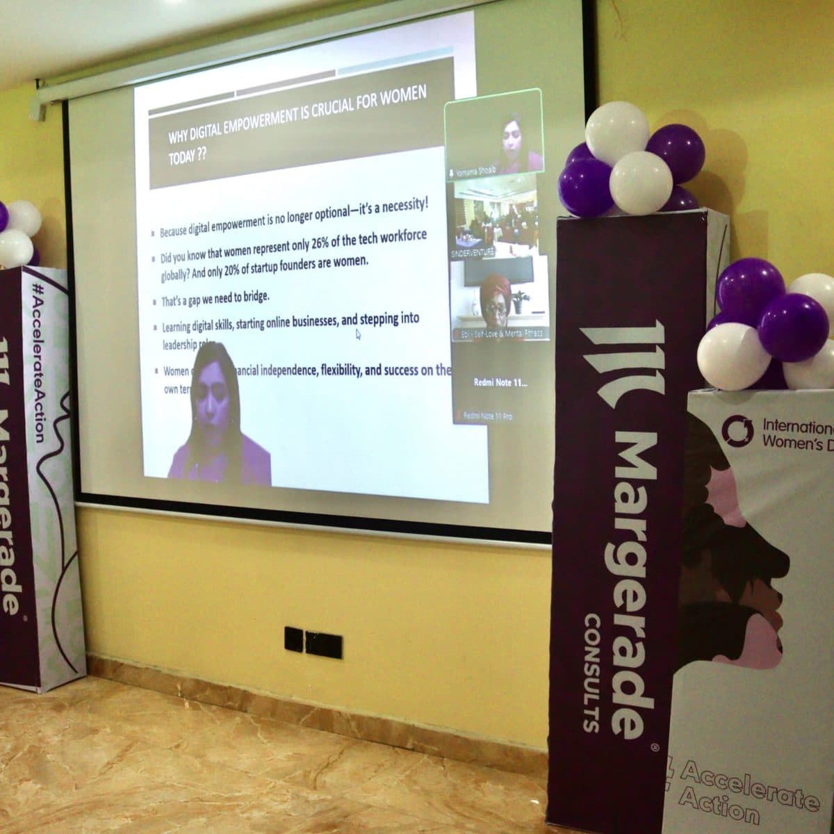 Yamama Shoaib presenting on screen at the Margerade Consults International Women's Day 2025 event